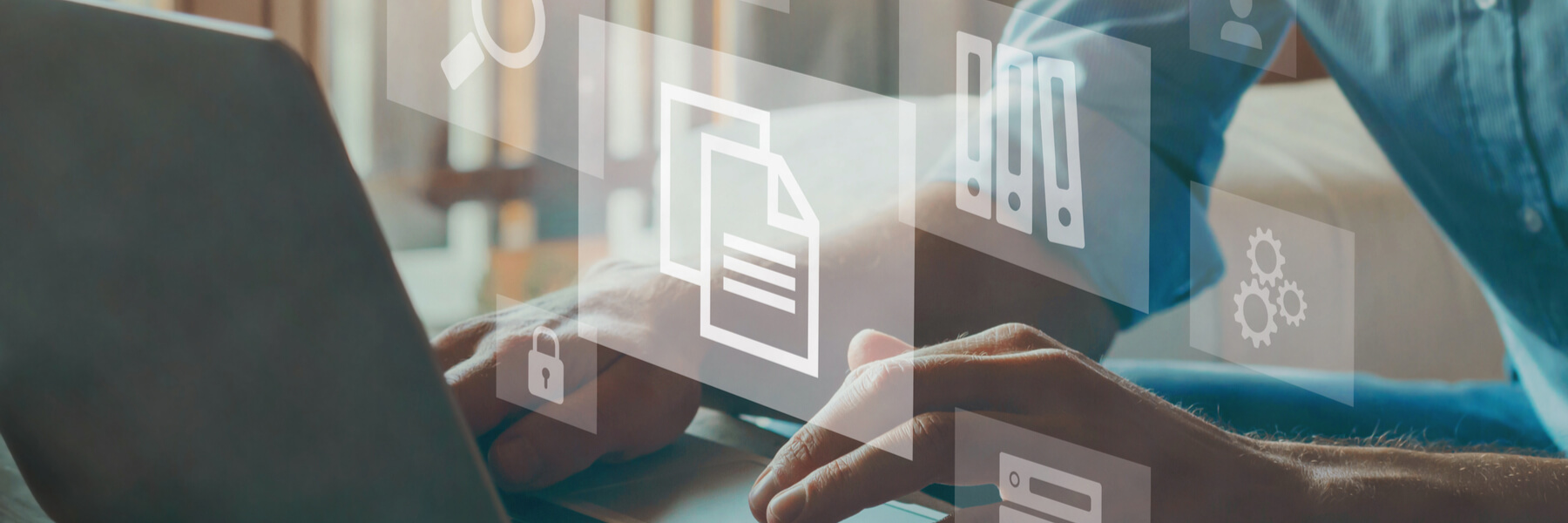 close up of business man working on laptop with a cloud-based document management system open, collaborating using the cloud for your remote or hybrid workforce